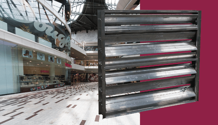 A damper beside an interior commercial space