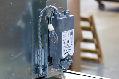An electric actuator installed on a damper