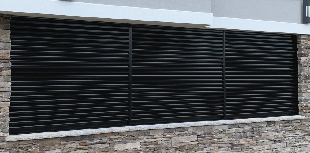 Example of a louver panel with discreet vertical mullions.