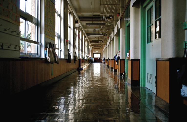 A hallway in a school during the morning